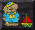 Cool Creations Embroidery Designs - Dogs and puppies, Puppy with toy boat