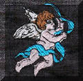 Cool Creations Embroidery Designs - Cherub with ribbon